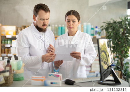 Director and pharmacist analyze documents, are horrified by results of work in current half-year Director and pharmacist analyze documents, are horrified by results of work in current half-year 131132813