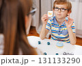 Child Learning with Flashcards and Alphabet Blocks at Home 131133290
