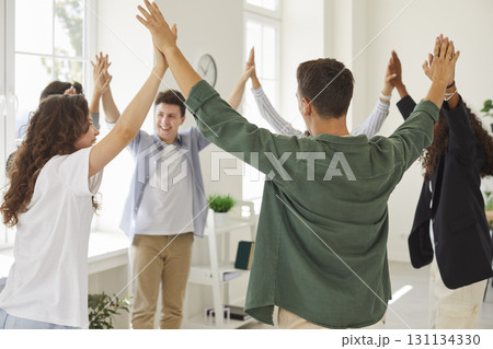 Group of happy diverse teenage boys and girls make friends and have fun at school 131134330