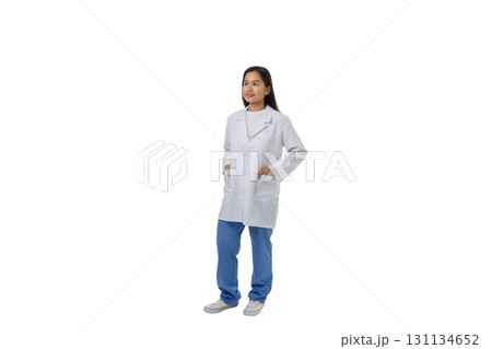 Young doctor stands confidently wearing a lab coat, isolated, PNG 131134652