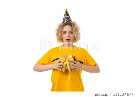 Excited girl with curly hair holds gift, isolated on white, PNG Excited girl with curly hair holds gift, isolated on white, PNG 131134677