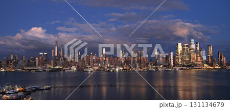 New York City skyline illuminated at dusk 131134679