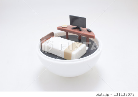 Miniature Bed And Desk Scene Inside White Bowl With Computer Model 131135075