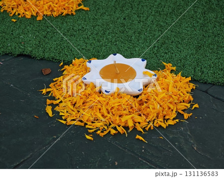 The Lanna candle trays with marigold petals. The Lanna candle trays with marigold petals. 131136583