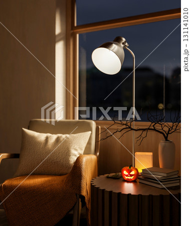 Armchair and glowing jack-o-lantern halloween pumpkin on table and standing lamp aside glass window. Armchair and glowing jack-o-lantern halloween pumpkin on table and standing lamp aside glass window. 131141010