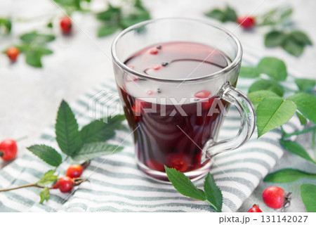 Rosehip tea warming drink with berries Rosehip tea warming drink with berries 131142027