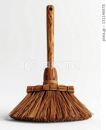 Rustic Wooden Straw Broom Tool with Natural Fiber Bristles Isolated on White Background Rustic Wooden Straw Broom Tool with Natural Fiber Bristles Isolated on White Background 131146078