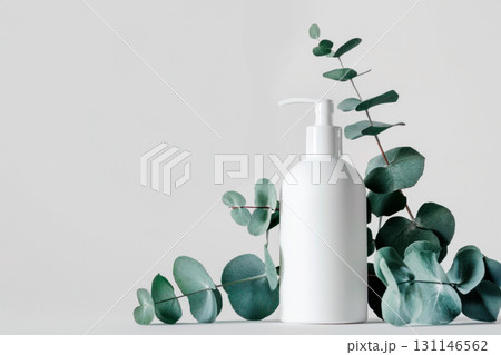 Mockup white bottle with dispenser for cleanser, soap on a white background. Packaging of cosmetic products. Copy space. 131146562