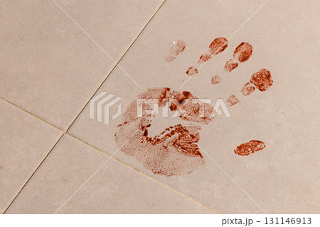 Bloody handprint crime scene on floor tiles Bloody handprint crime scene on floor tiles 131146913