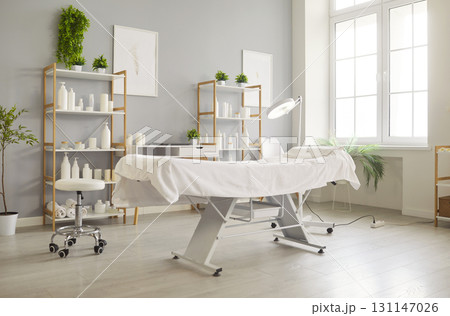 Clean, spacious cosmetology treatment room interior, no people 131147026