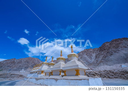 Himalayan Buddhist Stupas by Mountain Road Himalayan Buddhist Stupas by Mountain Road 131150335