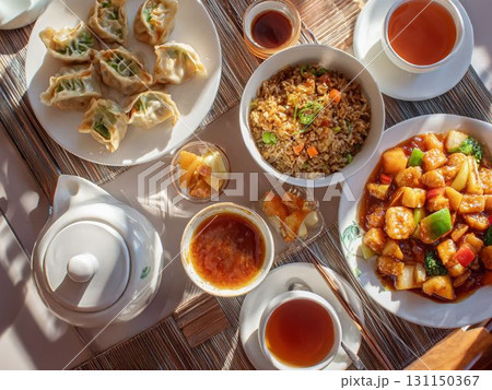 中華料理の盛り合わせ 餃子と炒飯とメイン料理 131150367