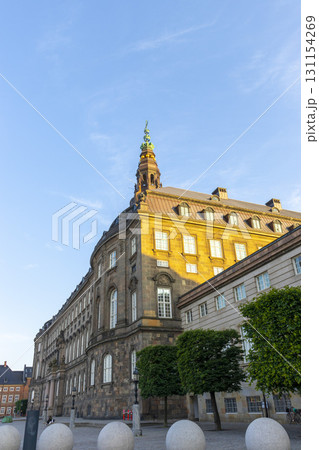 Copenhagen, Denmark - June 15,2022 : View of Christiansborg palace, famous landmark of danish capital, Copenhagen, Denmark on June 15, 2022. Copenhagen, Denmark - June 15,2022 : View of Christiansborg palace, famous landmark of danish capital, Copenhagen, Denmark on June 15, 2022. 131154269