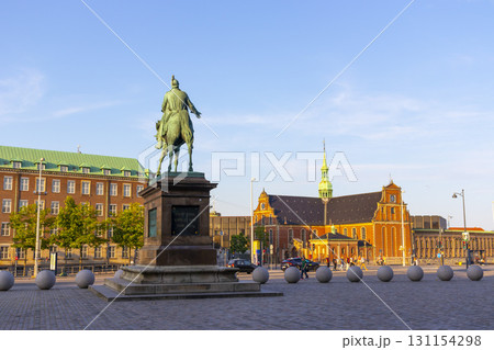 Copenhagen, Denmark - June 15,2022 : Equestrian Statue of King Frederik VII on Christiansborg Slotsplads (Castle Square) in Copenhagen, Denmark on June 15, 2022. Copenhagen, Denmark - June 15,2022 : Equestrian Statue of King Frederik VII on Christiansborg Slotsplads (Castle Square) in Copenhagen, Denmark on June 15, 2022. 131154298