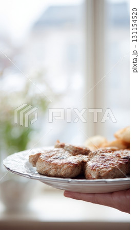 Grilled meat on a plate with side dishes showcasing traditional cuisine and protein-rich options 131154520