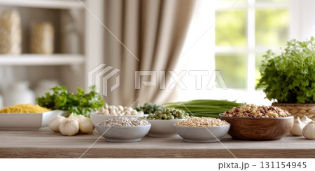 A kitchen island displays assorted fiber-rich foods like grains, nuts, and fresh herbs promoting wellness 131154945