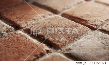 Handmade ceramic tiles in vibrant colors add creativity and texture to an accent wall in home renovation 131154971