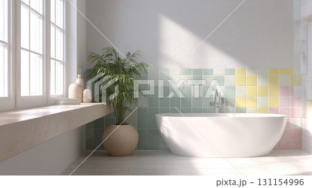 Unique ceramic tiles create a vibrant accent wall in a bright and inviting bathroom space 131154996