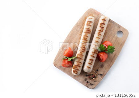 Grilled white sausages with cherry tomatoes and parsley Grilled white sausages with cherry tomatoes and parsley 131156055
