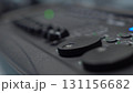Smooth focus movement along lighting console panel detailed professional equipment overview in 4K 131156682