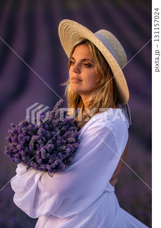 Lavender Field Woman Hat Sunset: Provence, France, summer photoshoot, showcasing beauty and nature. 131157024