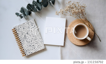 minimal flat lay with notebook and blank space 131158702