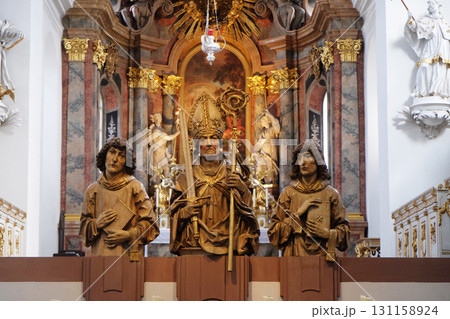 Statues of thre Martyrs Kilian, Colman and Totnan, Neumunster Collegiate Church in Wurzburg, Germany Statues of thre Martyrs Kilian, Colman and Totnan, Neumunster Collegiate Church in Wurzburg, Germany 131158924