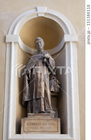 Saint Thomas Aquinas on the facade of St Nicholas Cathedral in Ljubljana, Slovenia 131160118