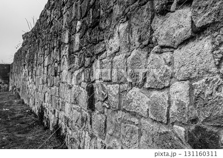fortress wall made of stones in gray tones, toning fortress wall made of stones in gray tones, toning 131160311
