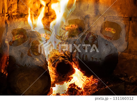 human skull translucent on the background of burning fire, ominous ghost design human skull translucent on the background of burning fire, ominous ghost design 131160312