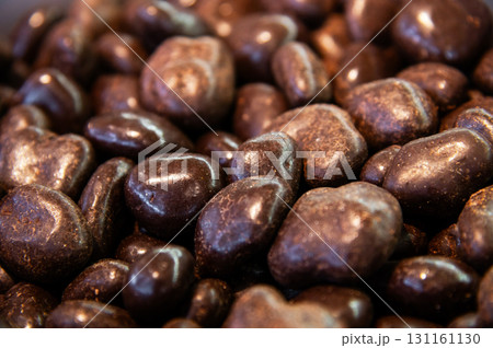 Chocolate-covered nuts. Lots of delicious treats on the store shelves. 131161130