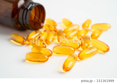 Fish oil or Cod liver oil gel in capsules with omega 3 vitamins, supplementary healthy food. 131161999