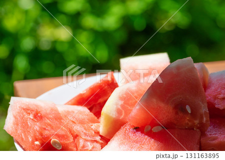 Red watermelon pieces in plate 131163895