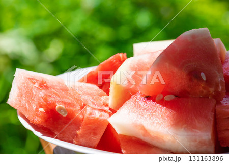 Red watermelon pieces in plate Red watermelon pieces in plate 131163896