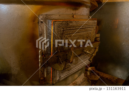 Rural furnace with burning fire Rural furnace with burning fire 131163911