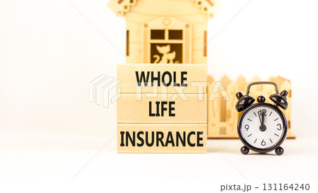 Whole life insurance symbol. Concept words Whole life insurance on beautiful wooden blocks. Beautiful white background. Black alarm clock. Business whole life insurance concept. Copy space. Whole life insurance symbol. Concept words Whole life insurance on beautiful wooden blocks. Beautiful white background. Black alarm clock. Business whole life insurance concept. Copy space. 131164240