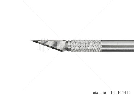 Silver craft knife isolated on white background Silver craft knife isolated on white background 131164410
