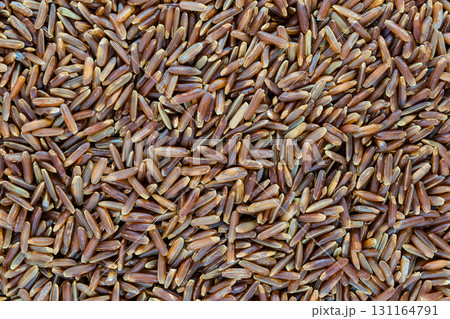 Very Sharp and Clear Background Surface of Red Rice Grains Very Sharp and Clear Background Surface of Red Rice Grains 131164791