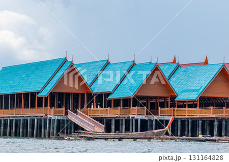 Wooden buildings with blue roofs in Koh Panyee village 131164828