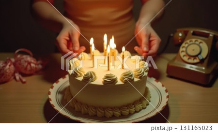 Vintage 1970s Birthday Celebration Hands Blowing Out Candles on Cake Vintage 1970s Birthday Celebration Hands Blowing Out Candles on Cake 131165023
