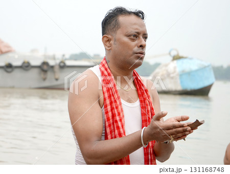 Spiritual Observance Tarpan at Ganga Ghat on Mahalaya 131168748