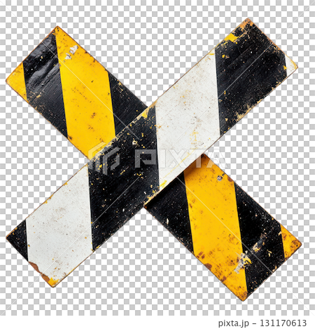Cautionary traffic sign with black and yellow stripes creating an X shape indicating hazard on road 131170613