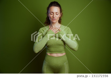 Green Calm: Hands Over Chest 131172356