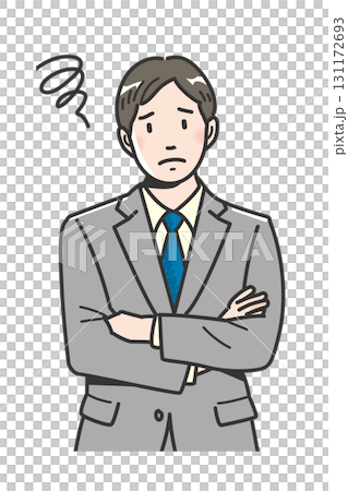 The upper body of a worried young businessman with his arms crossed 131172693