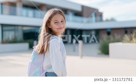 Back to school portrait of confident young student in denim and pastel tones 131172781