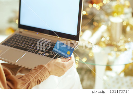 Close-up: Online Payment with Credit Card and Laptop Close-up: Online Payment with Credit Card and Laptop 131173734