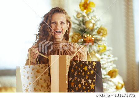 Joyful Holiday Shopper Looks at Camera 131173772