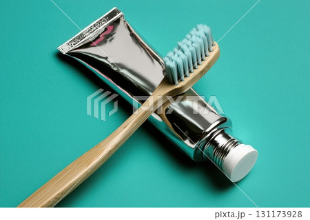 A toothbrush and a tube of toothpaste 131173928