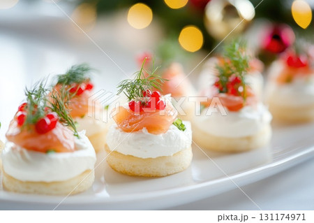 Festive holiday appetizers with smoked salmon and cream cheese on elegant display 131174971