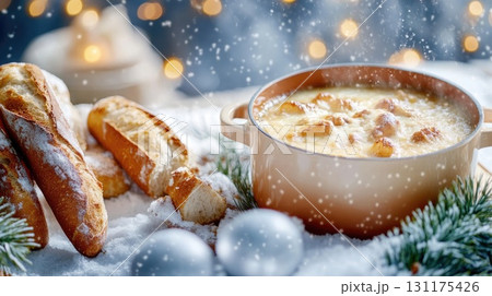 Cozy winter soup in a steaming pot with fresh bread and snowy backdrop 131175426